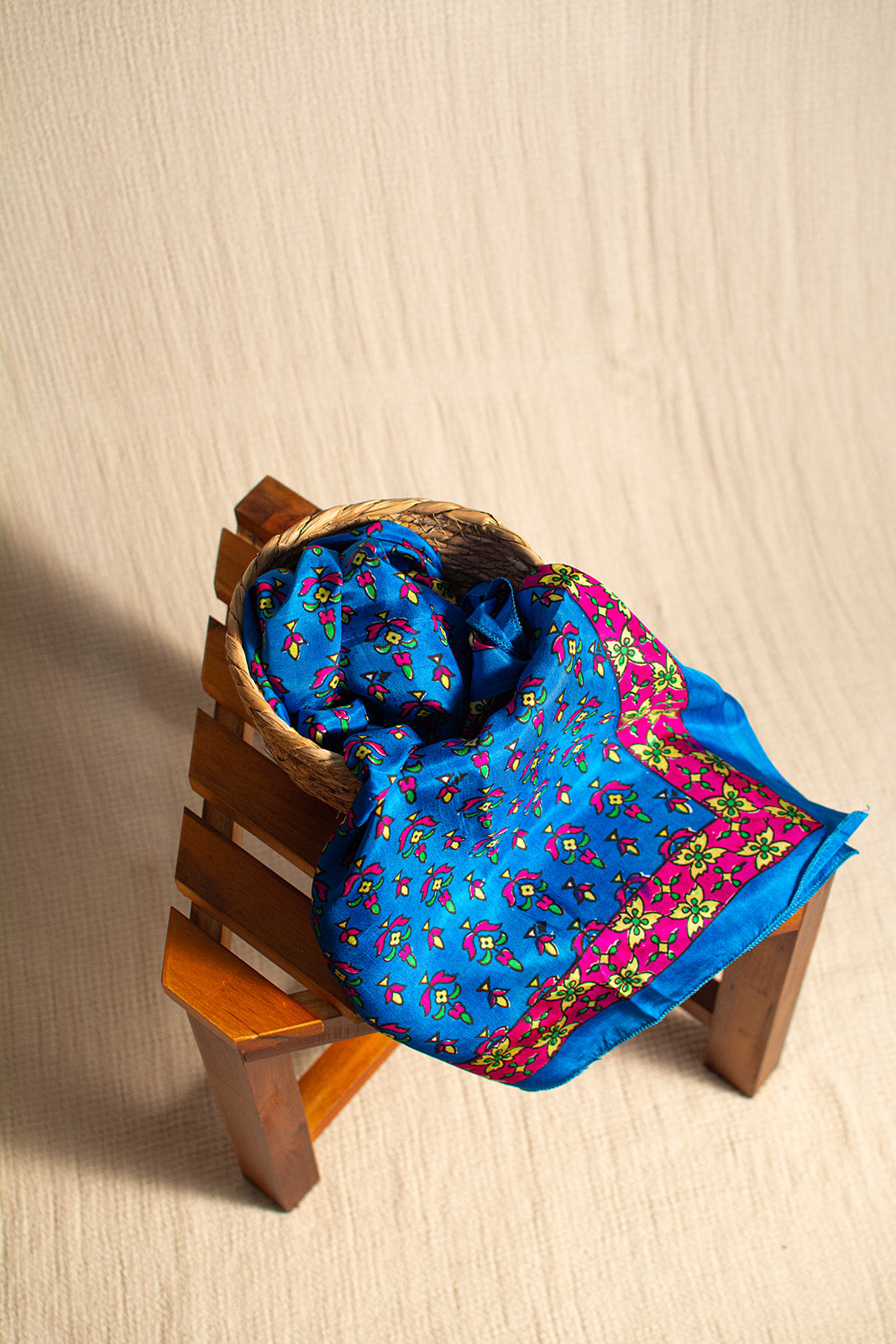 A blue patterned scarf