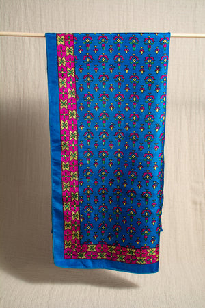 A blue patterned stole