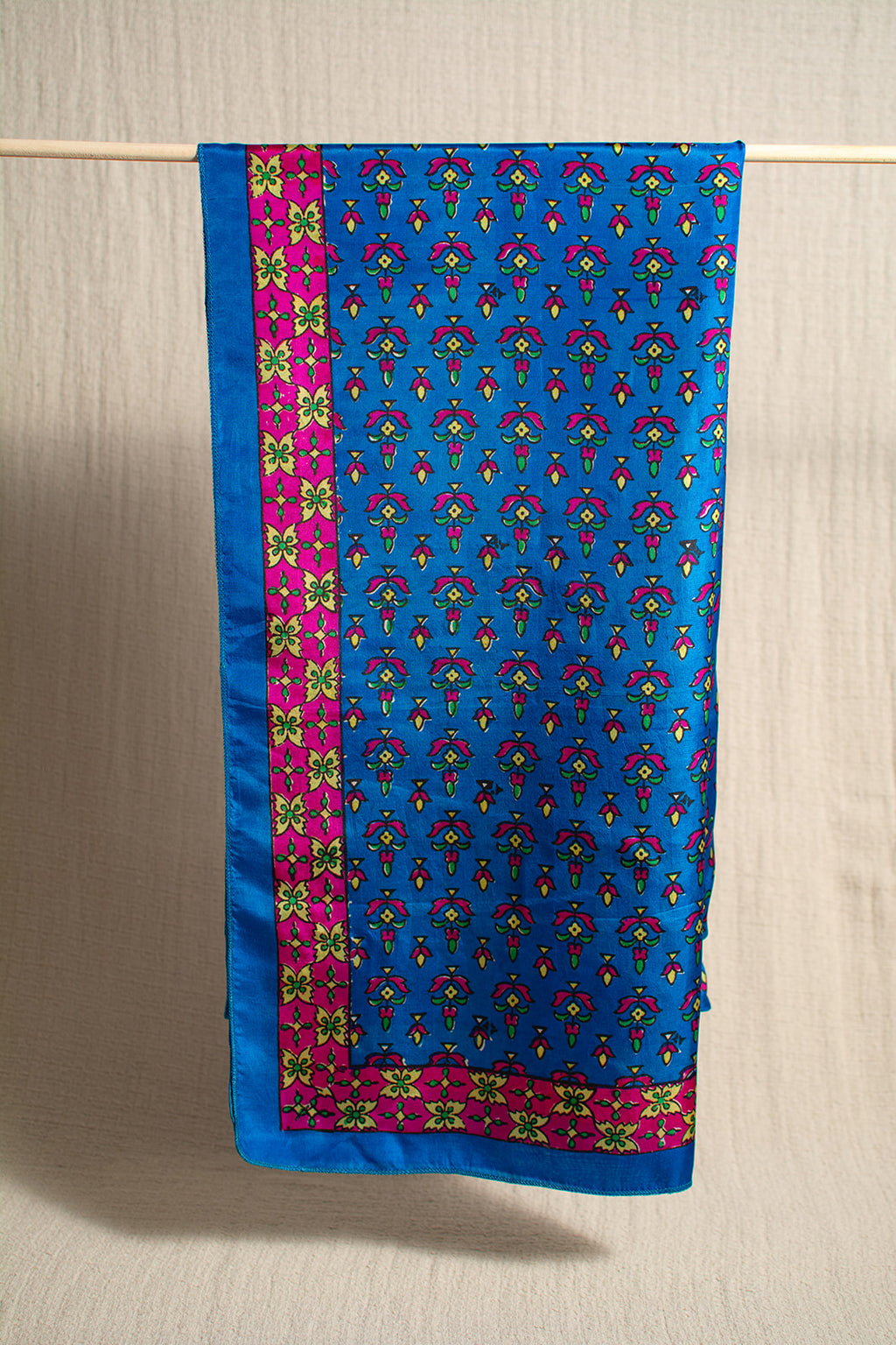 A blue patterned stole